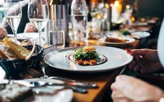A plated dish going out to a table